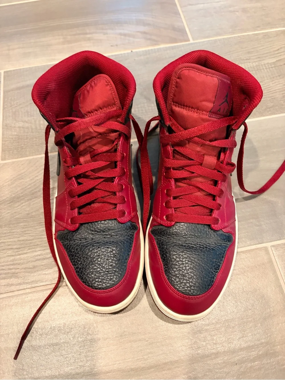 Nike Jordan Red and Black Mid-Top Sneakers